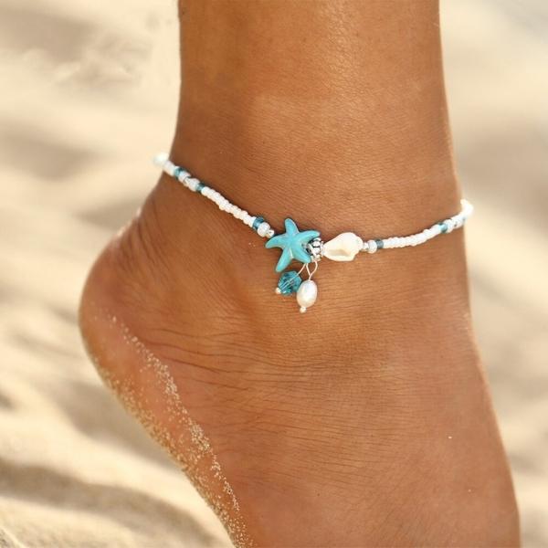 Stjerne- og skjellanklet armbånd med naturlige steiner