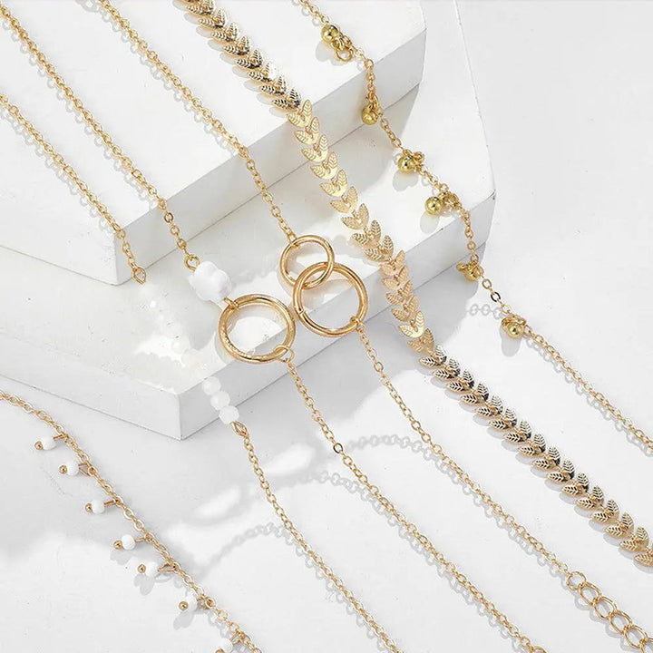 Pakke med Bohemsk Armbånd i Gull